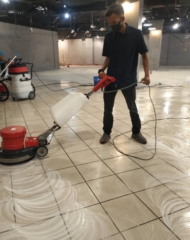 Floor scrubbing and polishing in a commercial space